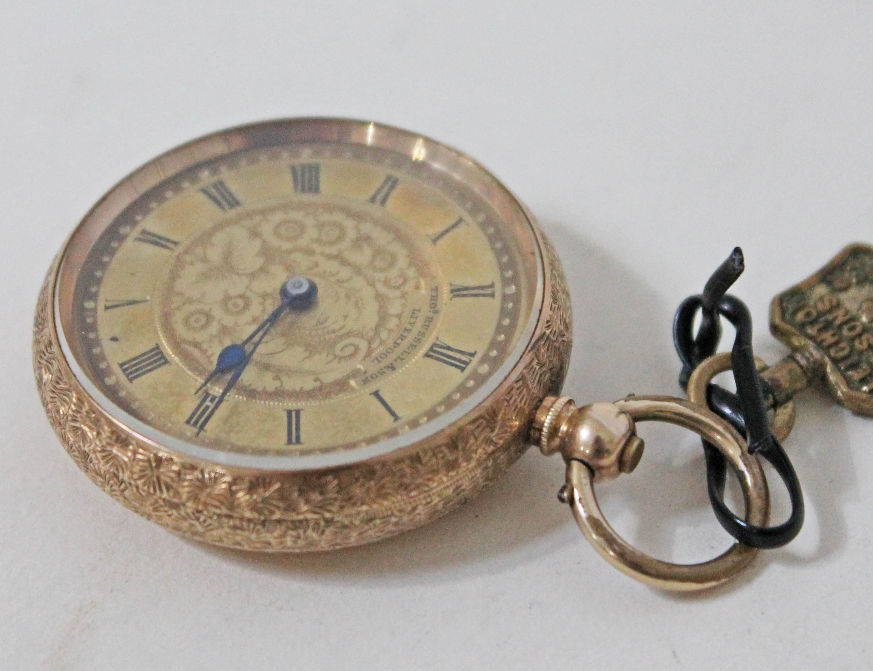 A yellow metal pocket watch marked '14K', diam. 3.8cm.