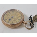 A yellow metal pocket watch marked '14K', diam. 3.8cm.