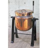 A large 19th Century steam jacketed copper jam pan with handle on stand, labelled 'Brown & Son