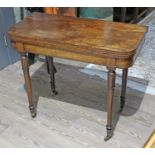 A George IV mahogany fold over card table, width 91.5cm, depth 45cm & height 75cm.