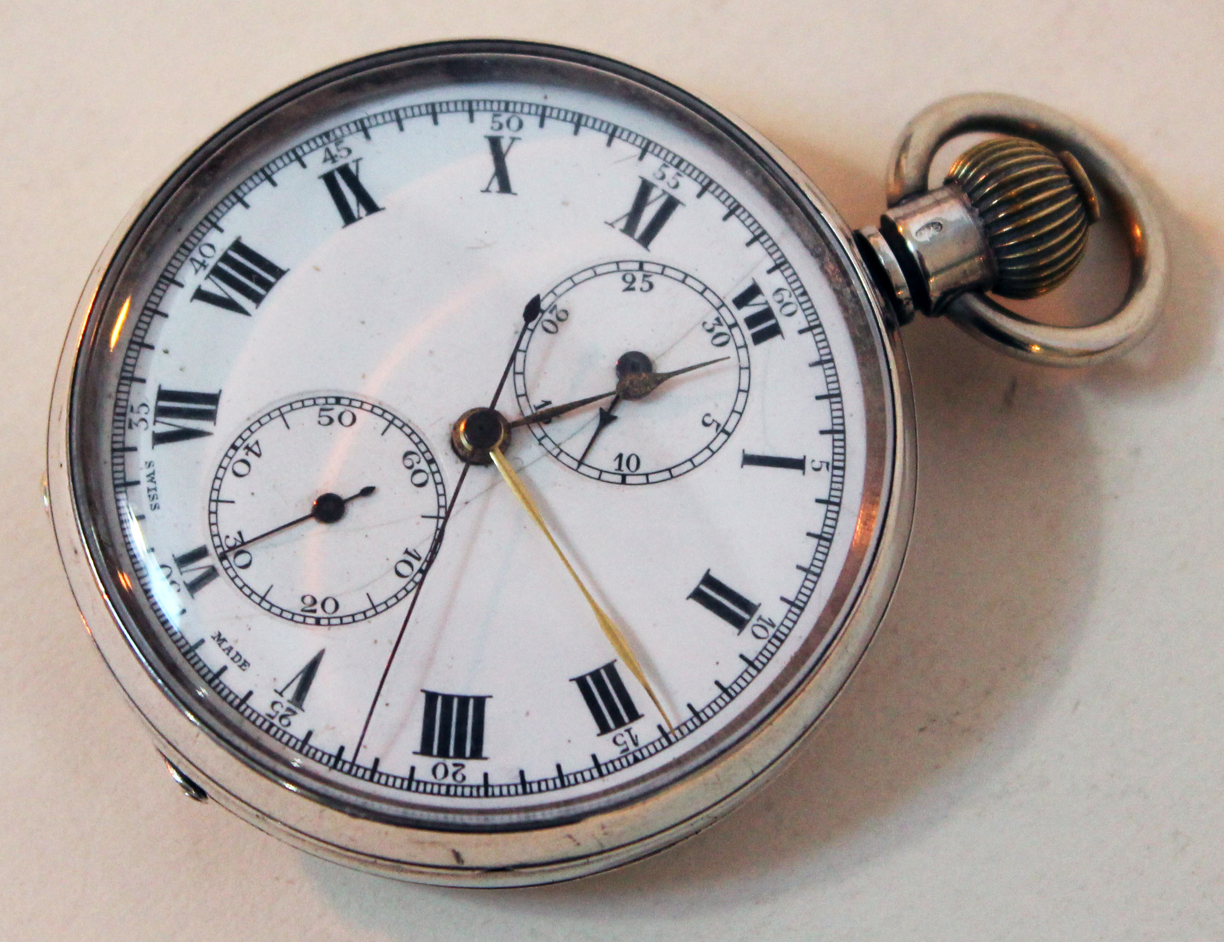 A hallmarked silver pocket watch, diam. 5cm.