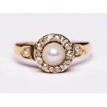 A hallmarked 15ct gold diamond and pearl ring, gross wt. 2.2g, size M.