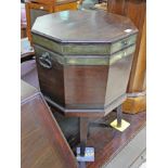 A George III brass bound mahogany wine cooler of hexagonal form, height 61.5cm.
