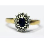 A 9ct gold diamond sapphire ring, gross wt. 2.4g, size N/O.