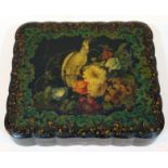 A Victorian papier mache box decorated with a bird within a floral border, the interior fitted