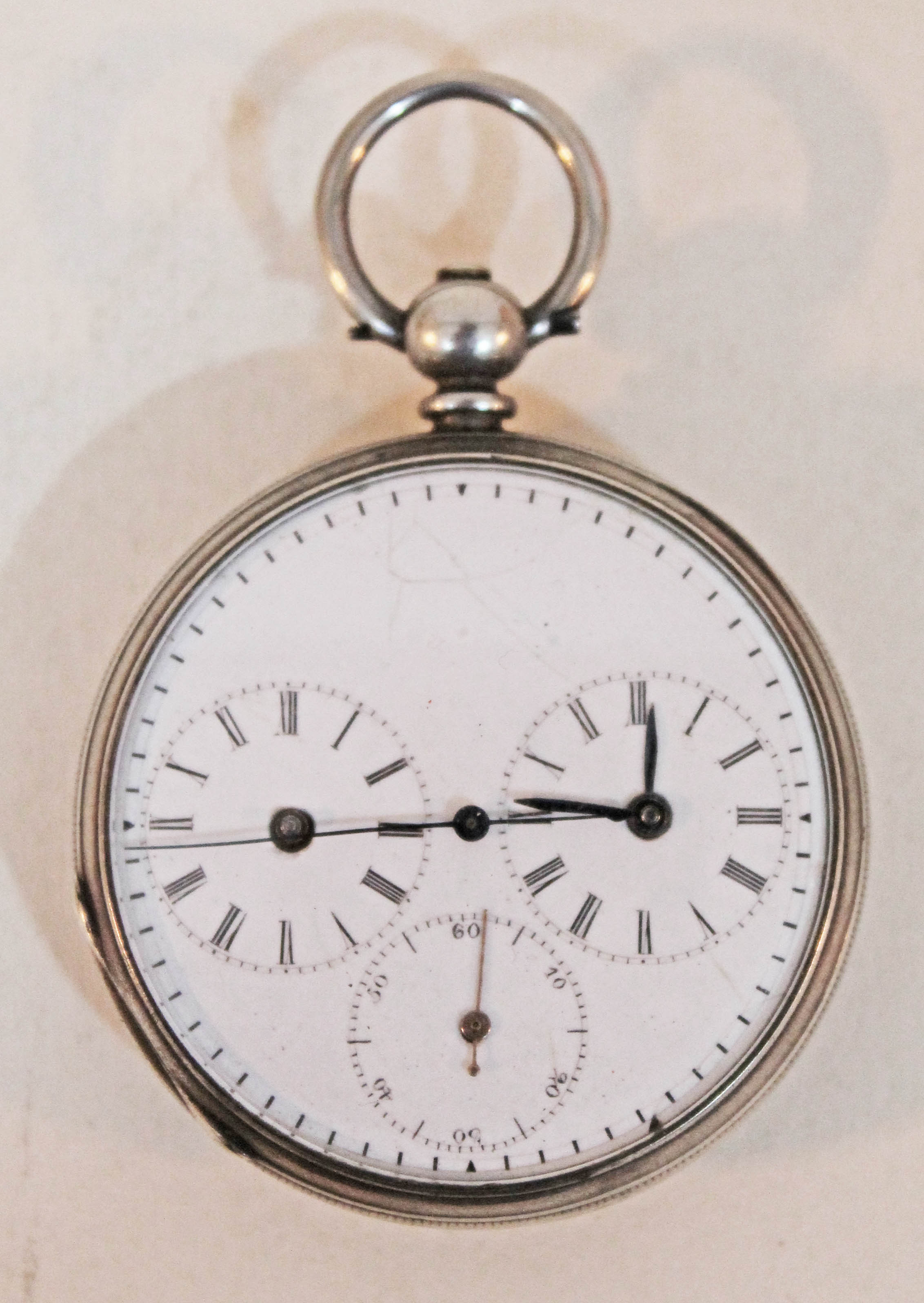 A Chinese Duplex pocket watch, white metal case, centre seconds dial with dual hour and minute