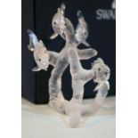 A Swarovski Crystal ornament formed as four fish swimming around coral, with box. Condition -