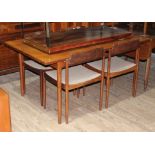 A G-Plan teak extending table with four chairs and two leaves, min, length 152.5cm, depth 89cm &