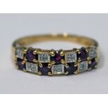 A 9ct gold diamond ruby ring, gross wt. 2.1g, size P.