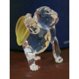 A Swarovski Crystal monkey carrying a bunch of bananas, boxed with certificate. Condition - good, no