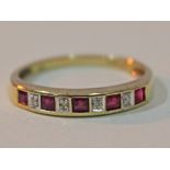 A hallmarked 9ct gold diamond and ruby ring, gross wt. 2.2g, size S.