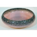 A Monart pink glass and aventurine fleck bowl, diam. 23.5cm.