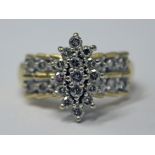 A yellow metal diamond cluster ring, unmarked, gross wt. 6g, size N.