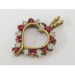 A 9ct gold diamond and ruby heart shaped pendant, length 2.4cm, gross wt. 2g.