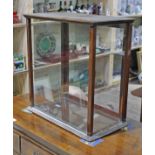 An Edwardian mahogany and glass shop display cabinet, width 56cm, depth 30cm & height 58cm.