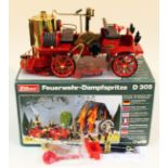 A Wilesco D305 live steam model fire truck. Condition - boxed and unused but lacking figures.