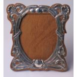 A hallmarked silver mounted oak photo framed, height 18.5cm.