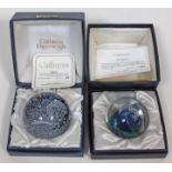 Two Caithness glass paperweights Zephyr and 1st Quarter, boxed with certificates.