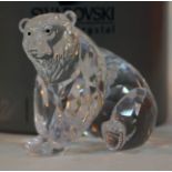 A Swarovski Crystal bear, boxed with certificate. Condition - good, no damage/repair.