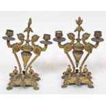 A pair of 19th Century gilt metal candlesticks, height 30cm.