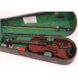 An English 20th Century violin labelled 'Morton Bros & Co', back length 35cm, with bow and hard