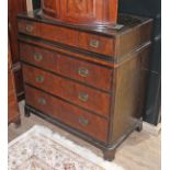 An Edwardian inlaid chest of drawers with brass handles and bracket feet, width 105cm, depth