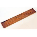 A Stanley multi purpose shipping slide rule with 'Displacement in Tons', 'Value of CM', 'Value of