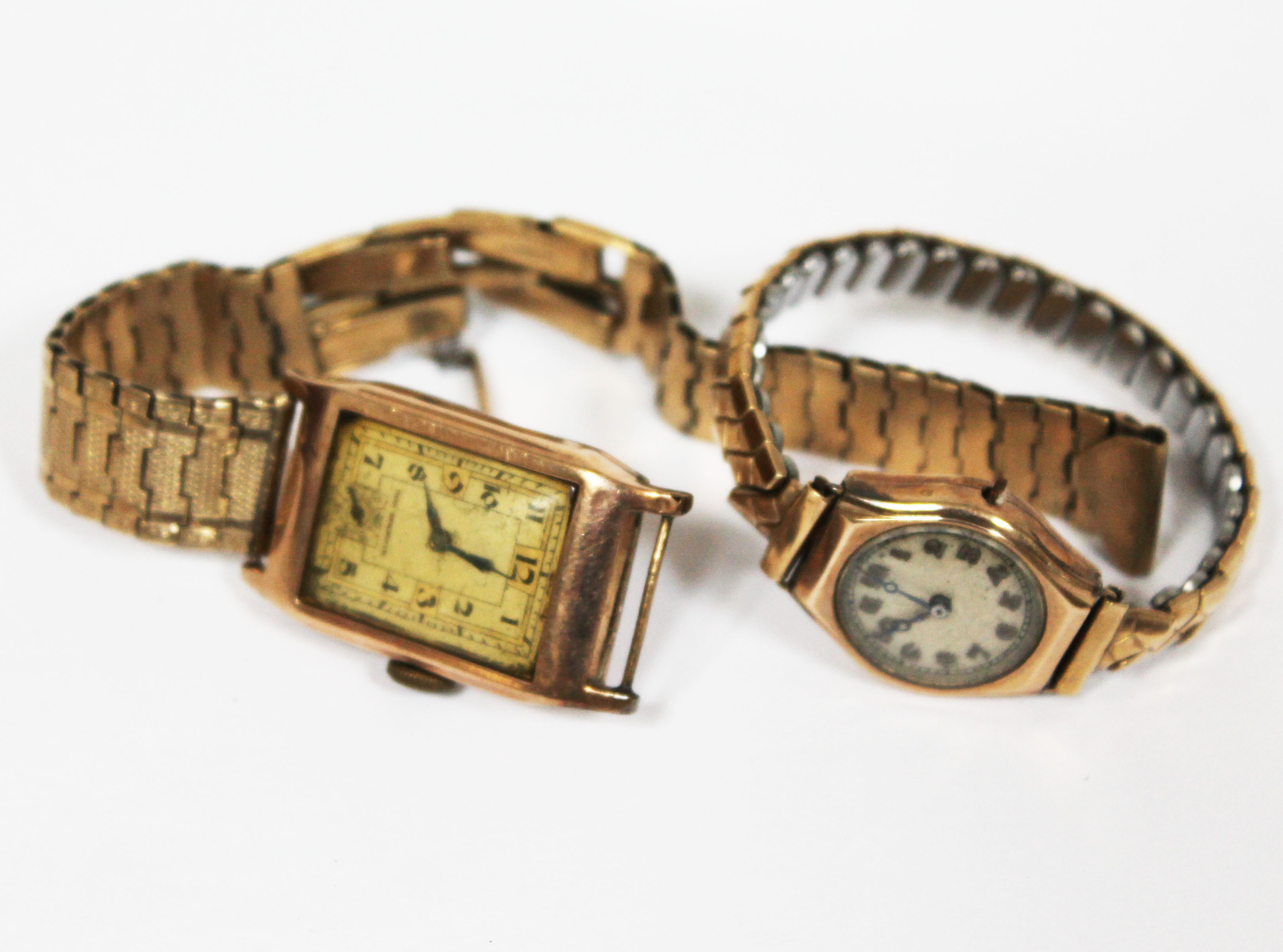 A hallmarked 9ct gold Art Deco style wristwatch with strap marked '9ct', gross wt. 32.4g and a