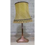 A triangular section copper lamp circa 1900, height (including shade) 66cm.