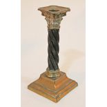 A twist horn and brass Corinthian column candlestick, height 19.5cm.