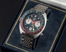 A VERY RARE GENTLEMAN'S "NOS" STAINLESS STEEL HEUER AUTAVIA GMT AUTOMATIC CHRONOGRAPH BRACELET WATCH