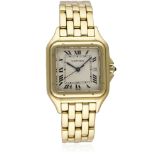 A GENTLEMAN'S 18K SOLID GOLD CARTIER PANTHERE BRACELET WATCH CIRCA 1990s D: Silver dial with Roman