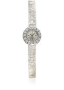 A FINE LADIES 18K SOLID WHITE GOLD & DIAMOND OMEGA BRACELET WATCH CIRCA 1960s D: Silver dial with