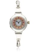 A LADIES SOLID SILVER & ENAMEL ROLEX HALF HUNTER BRACELET WATCH CIRCA 1920s  D: White enamel dial.