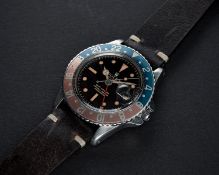 AN EXTREMELY RARE GENTLEMAN'S STAINLESS STEEL ROLEX OYSTER PERPETUAL GMT MASTER WRIST WATCH CIRCA