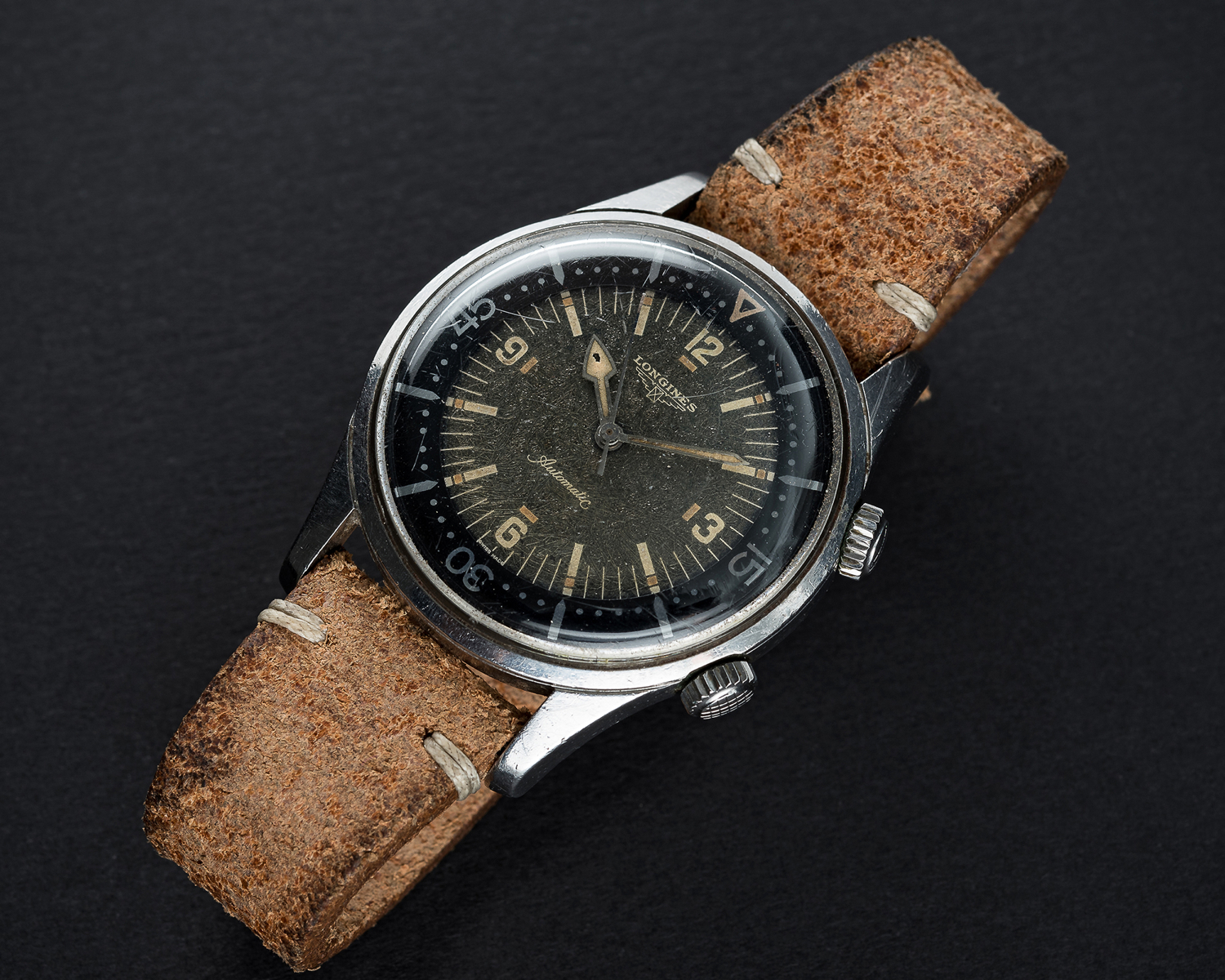 A VERY RARE GENTLEMAN'S STAINLESS STEEL LONGINES DIVERS WRIST WATCH CIRCA 1962, REF. 7042-3 WITH "