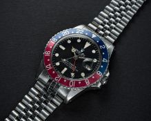 A RARE GENTLEMAN'S STAINLESS STEEL ROLEX OYSTER PERPETUAL GMT MASTER "PINK PANTHER" BRACELET WATCH