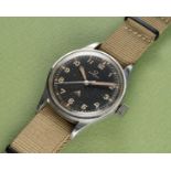 A RARE GENTLEMAN'S STAINLESS STEEL BRITISH MILITARY OMEGA RAF PILOTS WRIST WATCH DATED 1953, REF.