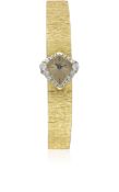 A FINE LADIES 18K SOLID GOLD & DIAMOND PIAGET BRACELET WATCH CIRCA 1970s Movement: Manual back wind,