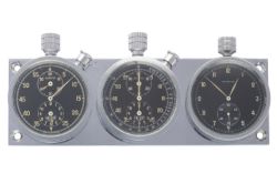 A VERY RARE HEUER AUTAVIA HERVUE TRIPLE DASHBOARD SET CIRCA 1950, WITH GLOSS BLACK DIALS Movement: