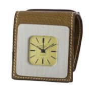 A HERMES PARIS TRAVEL ALARM CLOCK  CIRCA 1970s Movement: Mechanical. Case: Approx. 40mm by 40mm,