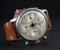 A VERY RARE GENTLEMAN'S LARGE SIZE STAINLESS STEEL HEUER TRIPLE CALENDAR CHRONOGRAPH WRIST WATCH