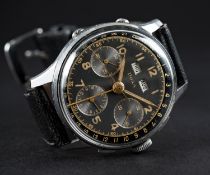 A RARE GENTLEMAN'S STAINLESS STEEL DOXA TRIPLE CALENDAR CHRONOGRAPH WRIST WATCH CIRCA 1940s, WITH