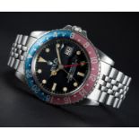 A GENTLEMAN'S STAINLESS STEEL ROLEX OYSTER PERPETUAL GMT MASTER BRACELET WATCH CIRCA 1979, REF.