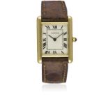 A GENTLEMAN'S 18K SOLID GOLD CARTIER TANK WRIST WATCH CIRCA 1970s Movement: Manual wind, signed