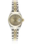 A LADIES STEEL & GOLD ROLEX OYSTER PERPETUAL DATEJUST BRACELET WATCH DATED 1990, REF. 69173 WITH