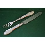 Victorian cake serving knife and fork with engraved silver blade and tines and finely carved pearl