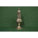 Silver pepper shaker having acorn finial and bulbous body, standing on a circular base,