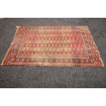 Red ground rug having white,