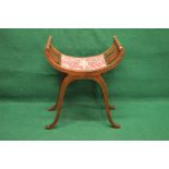 Mahogany X frame dressing stool having scrolled arms leading to padded seat,